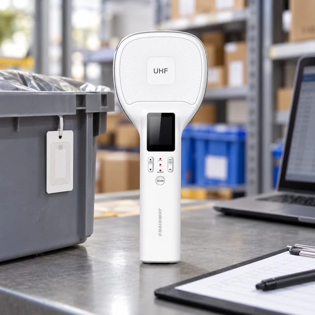 Bluetooth RFID Readers in a representative compact wireless RFID reader beside a tagged tote at a logistics workbench setting